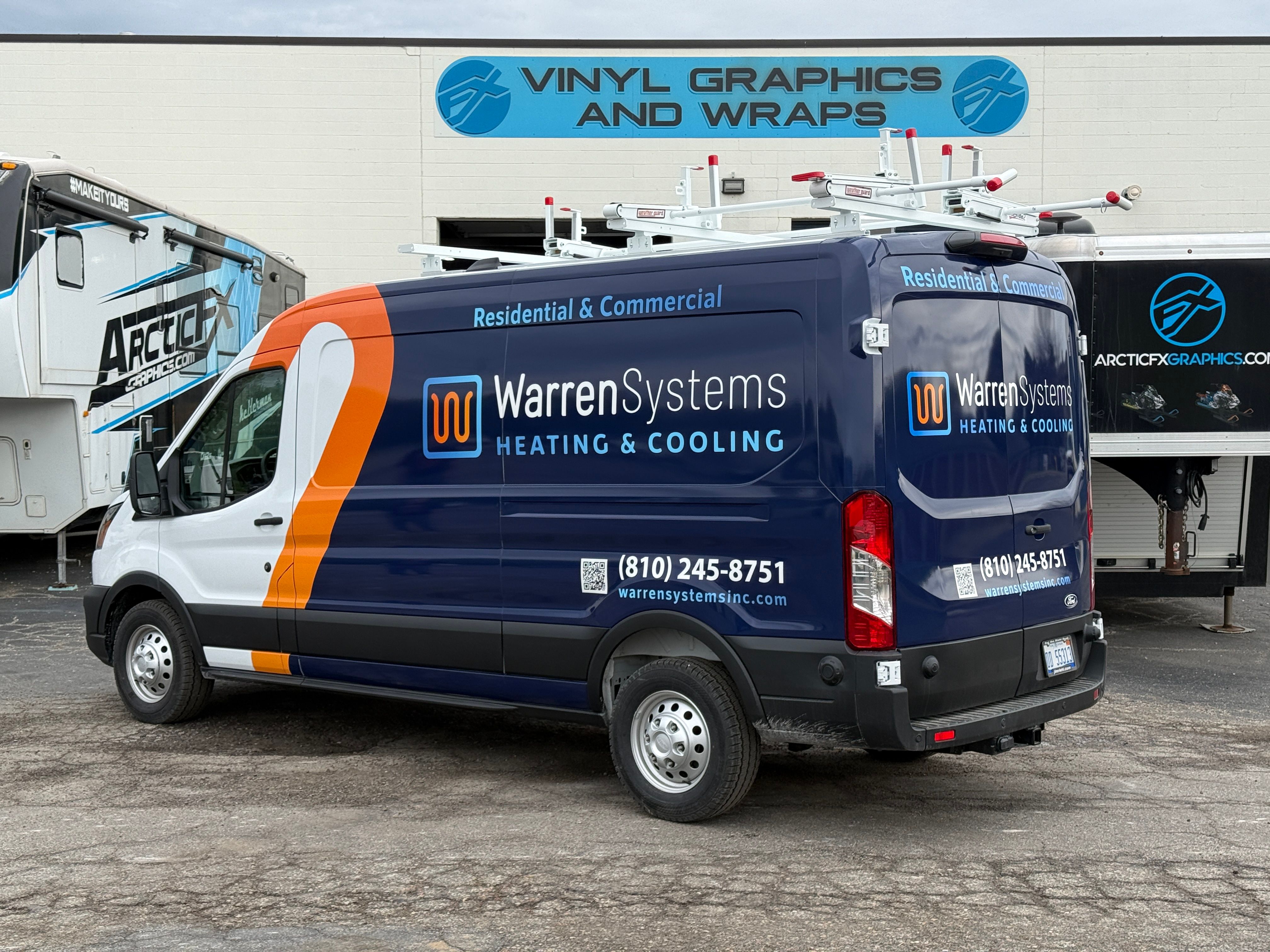 A commercial work van with a custom vinyl wrap with white, blue, and orange logos and design