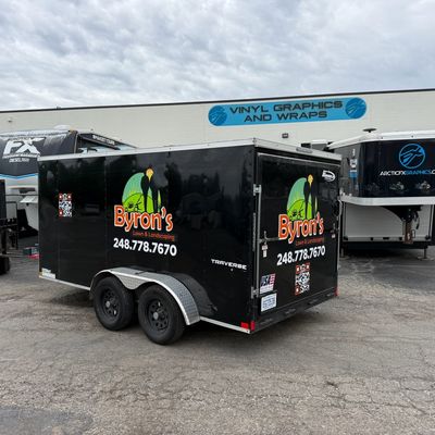 A commercial trailer with a custom vinyl wrap