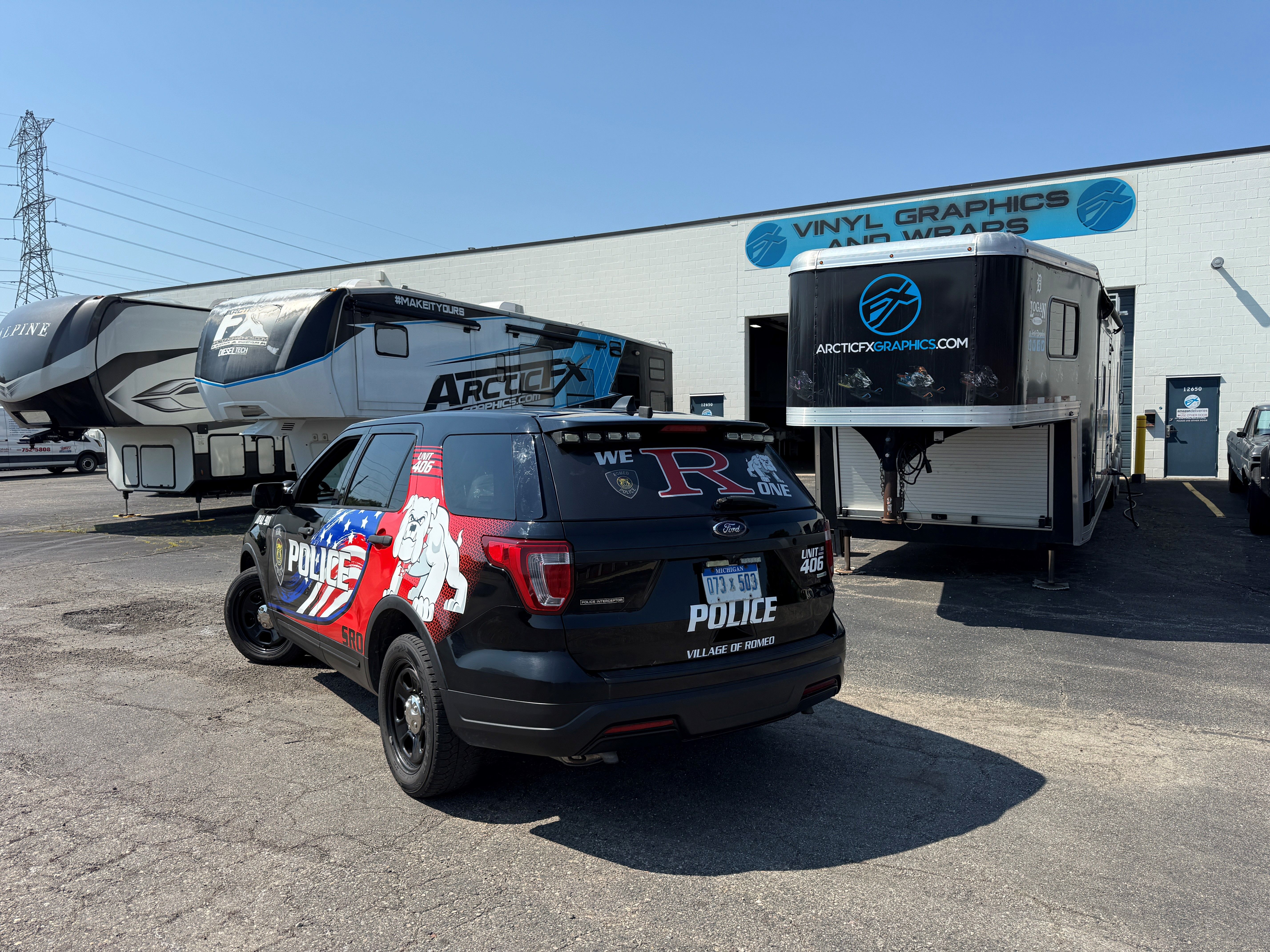 A police vehicle with an American Flag design  vinyl wrap